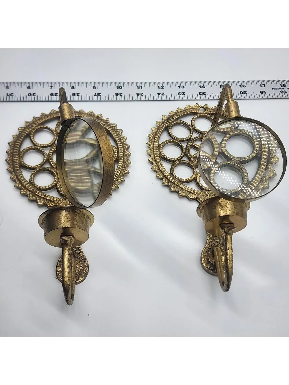 Pair of Brass Tone Wall Candle Sconces with Round Magnifying Glass Accent